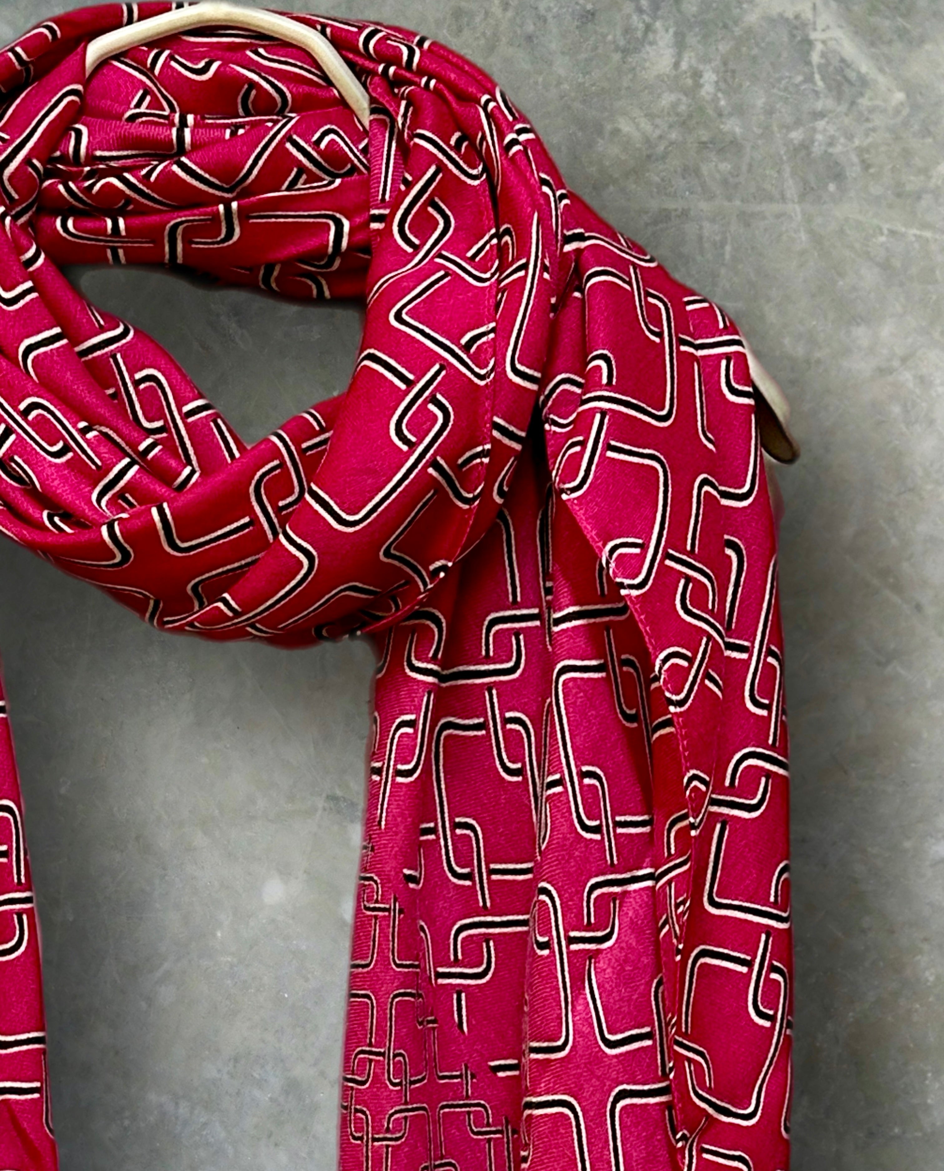 Stylish Pink Scarf Featuring Interlocking Design