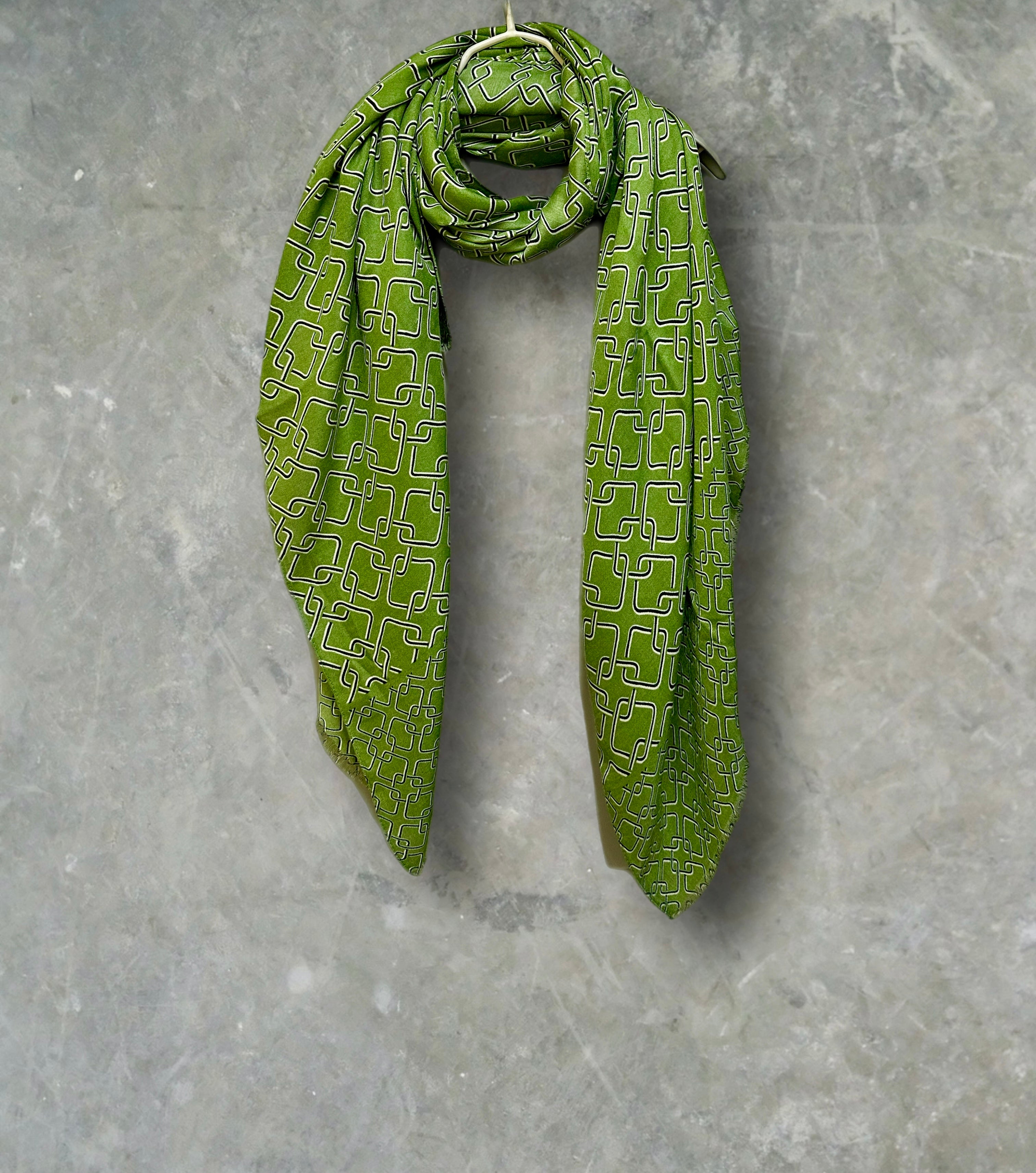 Stylish Green Scarf Featuring Interlocking Design