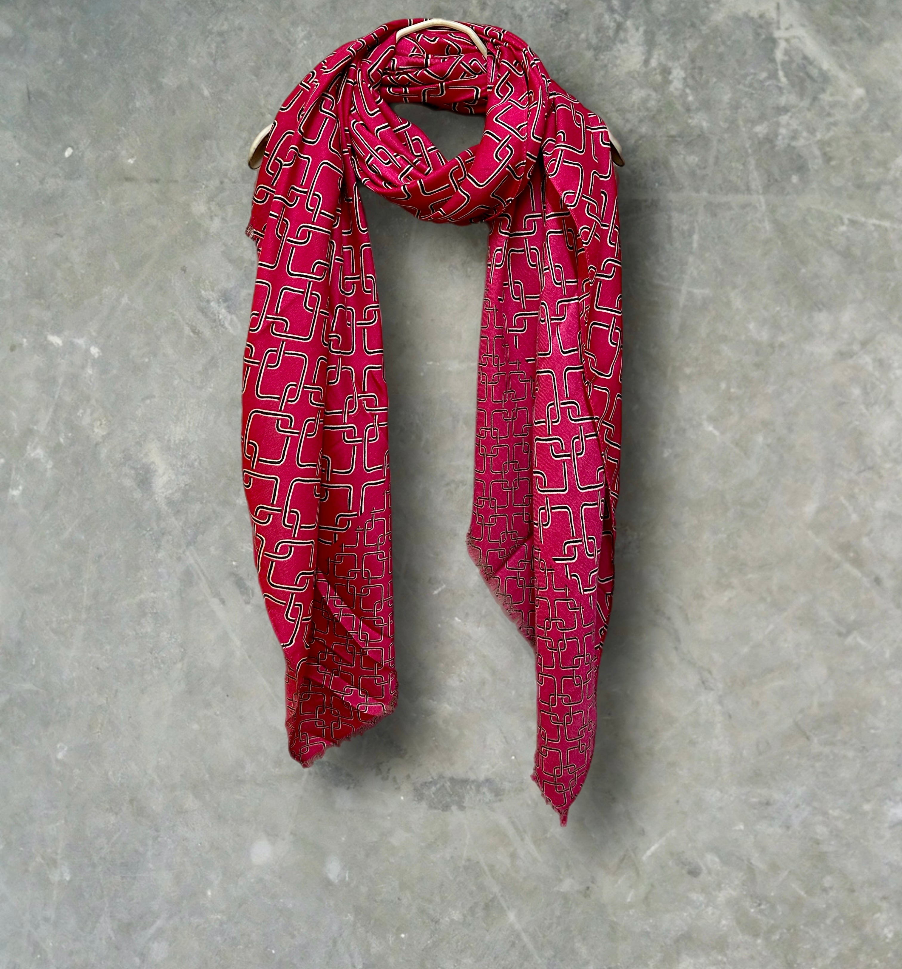 Stylish Pink Scarf Featuring Interlocking Design