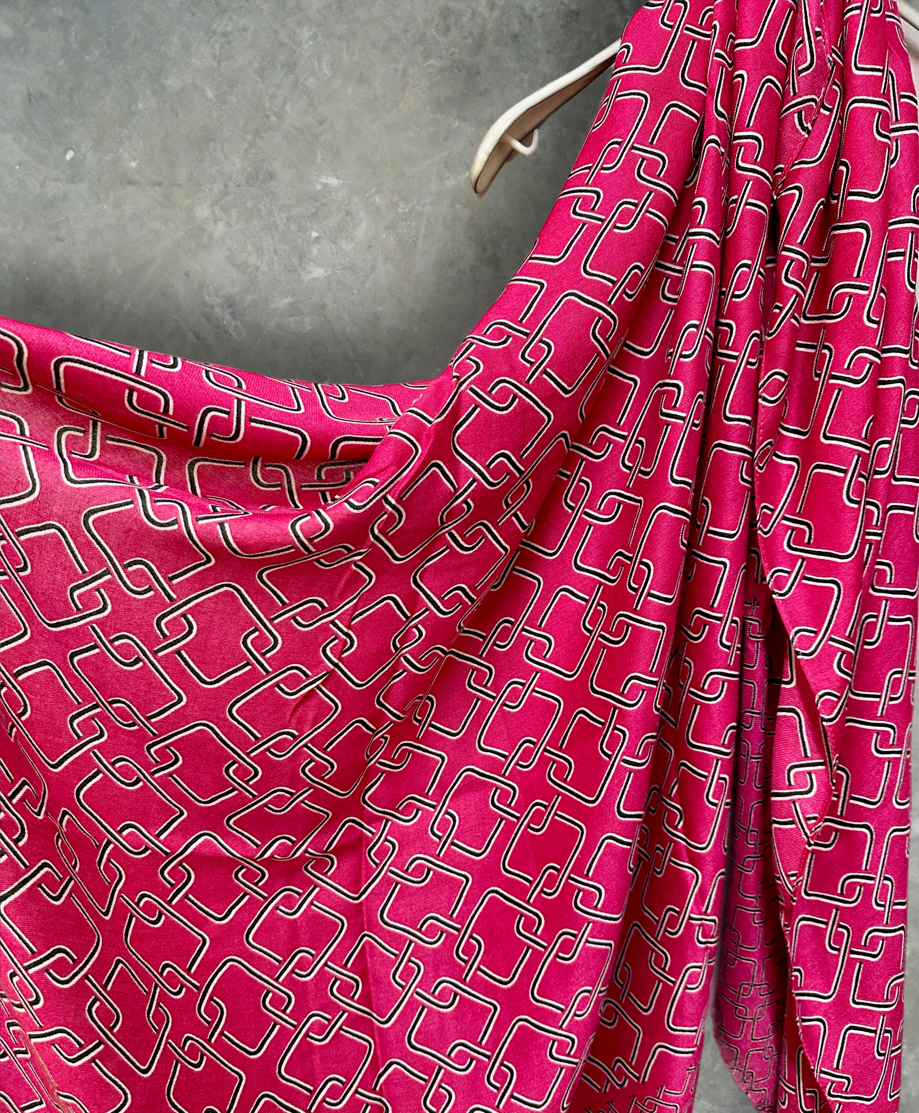 Stylish Pink Scarf Featuring Interlocking Design