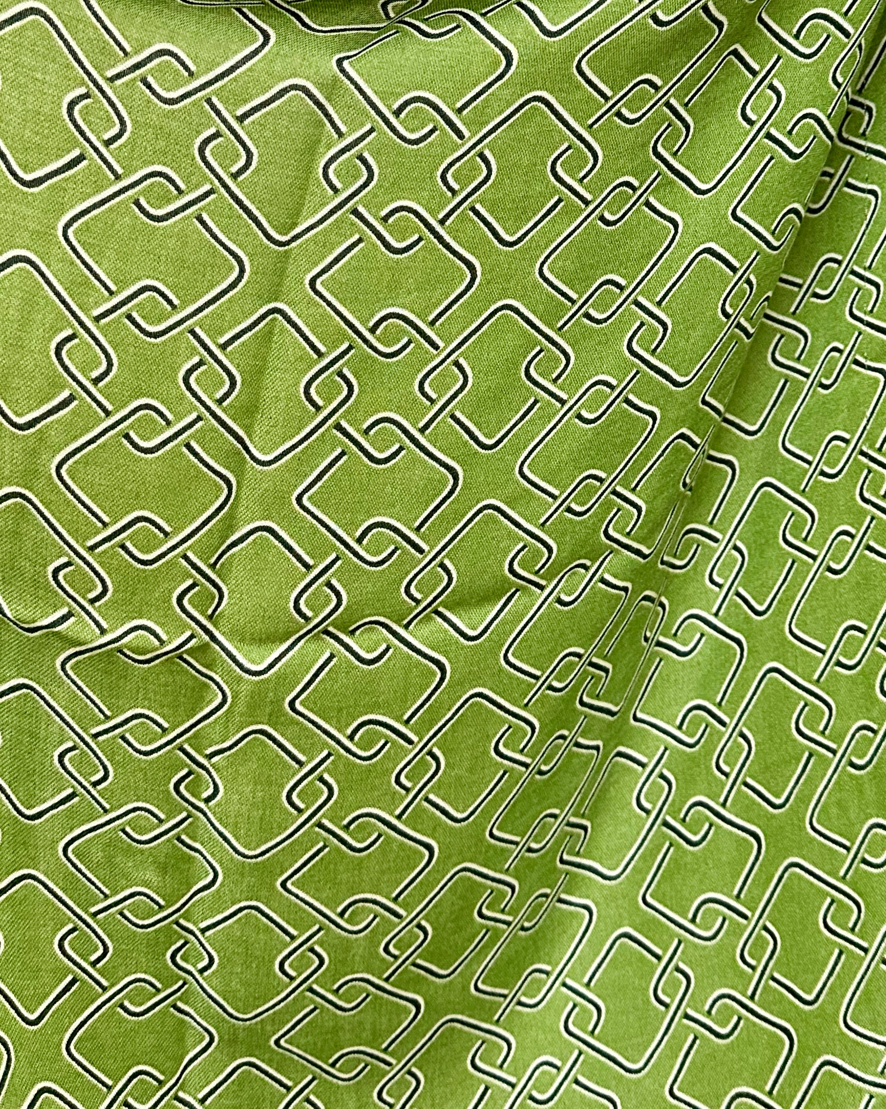 Stylish Green Scarf Featuring Interlocking Design
