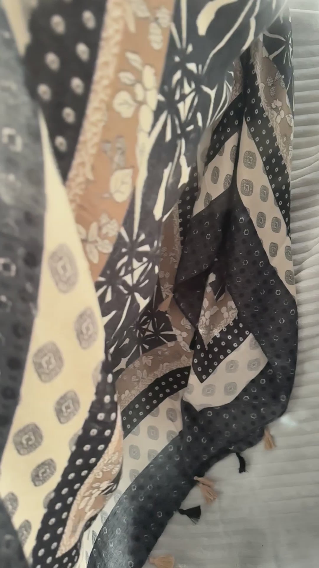 Black Cotton Scarf adorned with Bohemian Flowers Pattern and Tassels.