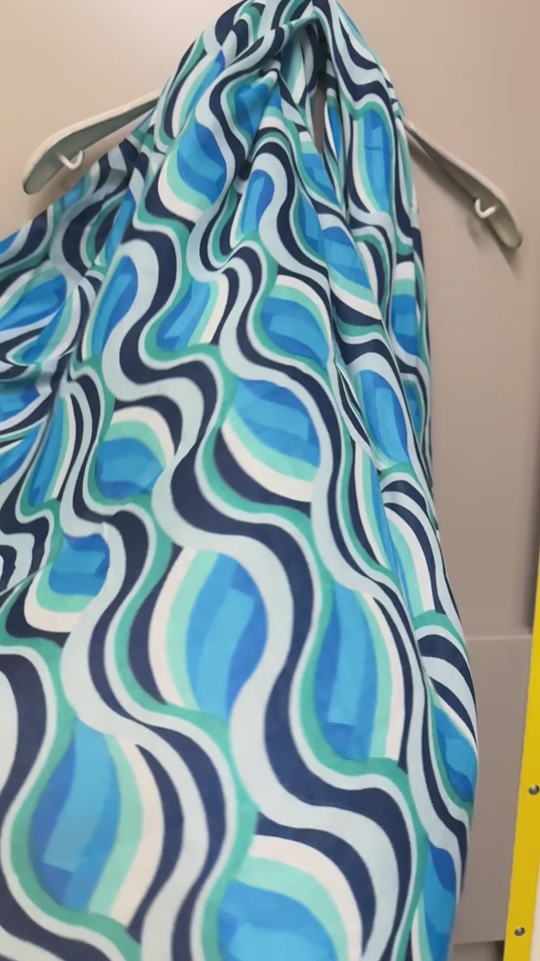 Versatile Blue Scarf Featuring Wavy Stripes