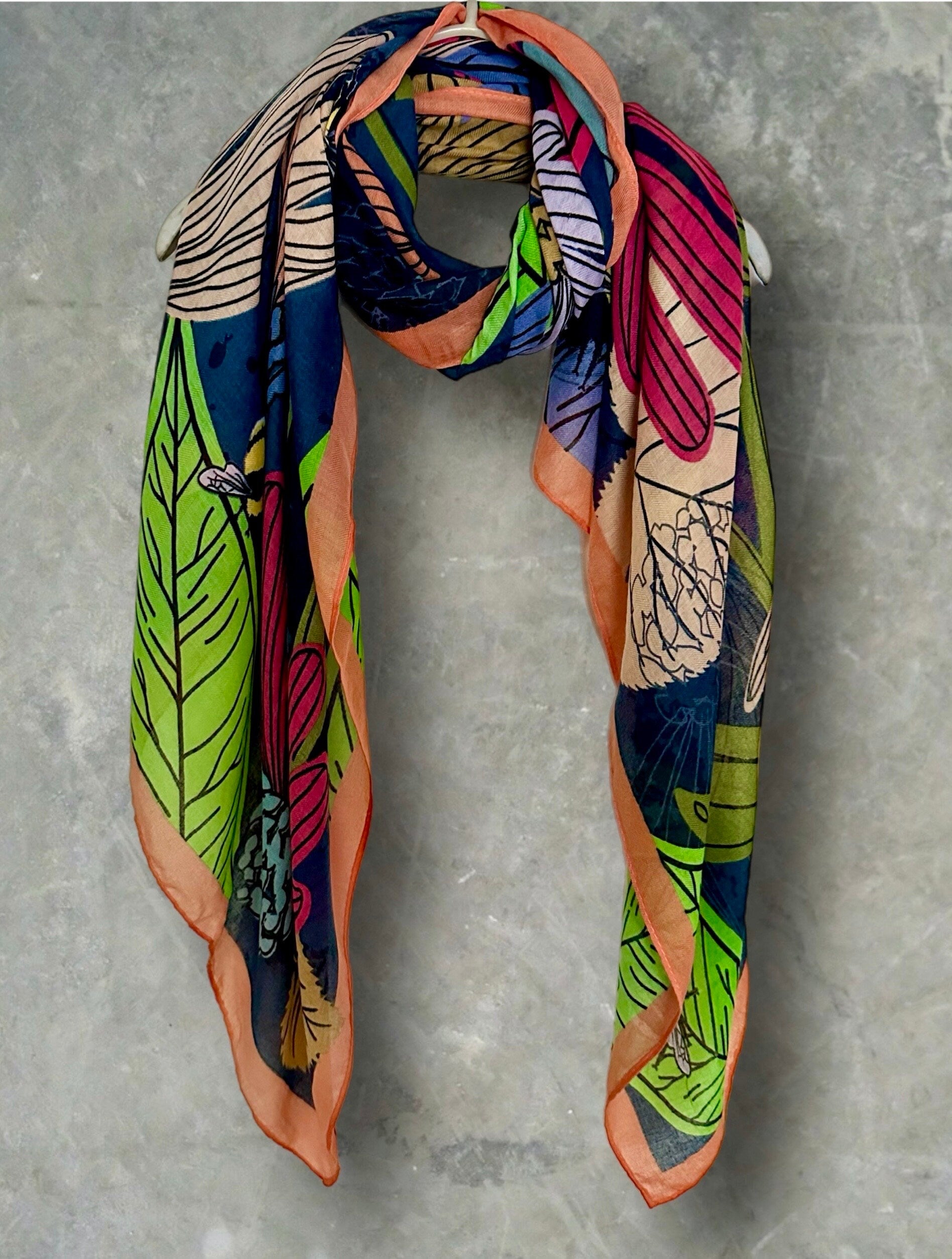 Tropical Floral Design Organic Cotton Blend Scarf with Orange Trim.