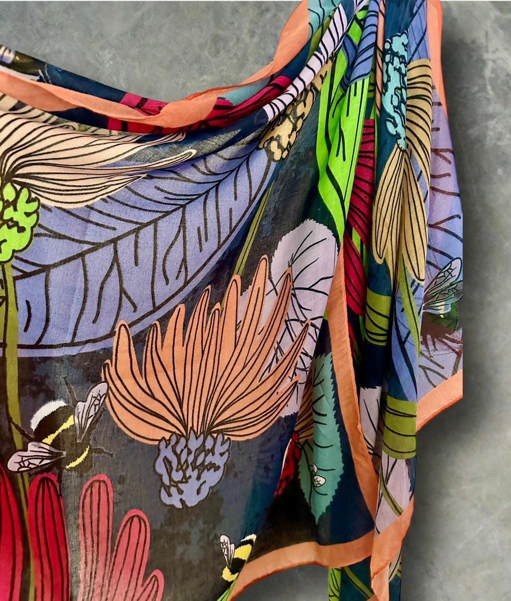Tropical Floral Design Organic Cotton Blend Scarf with Orange Trim.