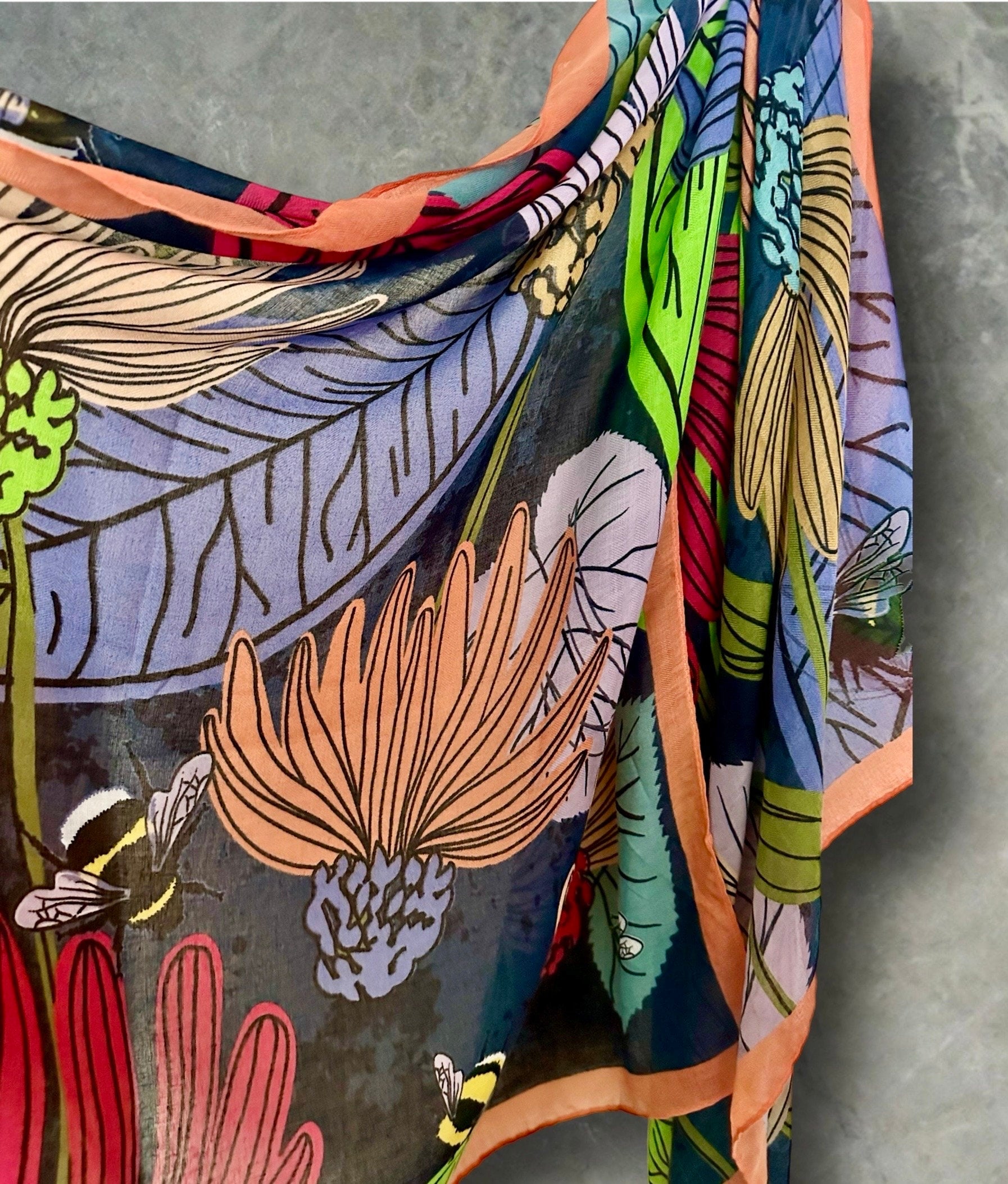 Tropical Floral Design Organic Cotton Blend Scarf with Orange Trim.
