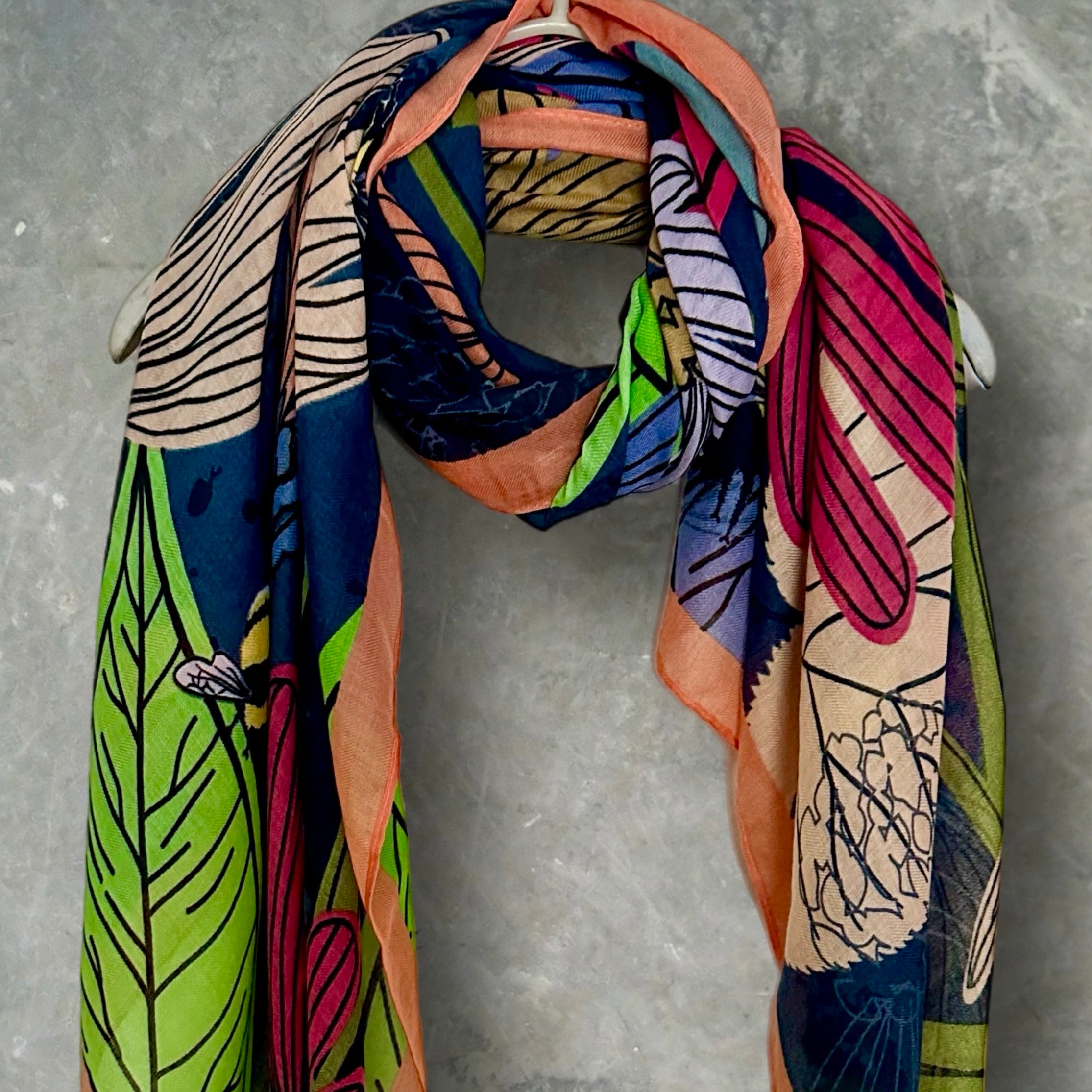 Tropical Floral Design Organic Cotton Blend Scarf with Orange Trim.